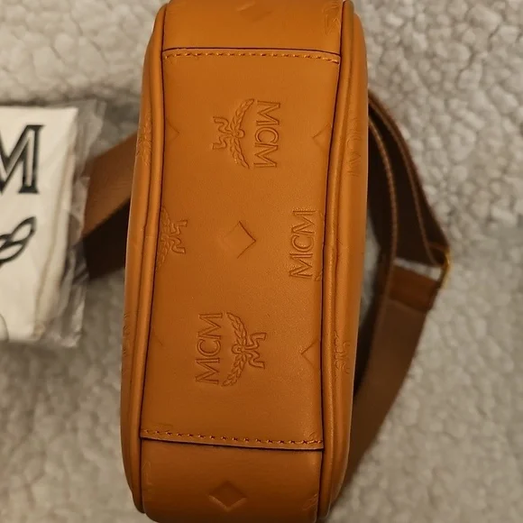 Auth MCM Tan Monogram Embossed Crossbody Bag